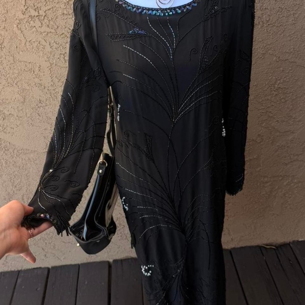 Vintage Black 100% silk beaded dress with long sleeves and a flowy silhouette